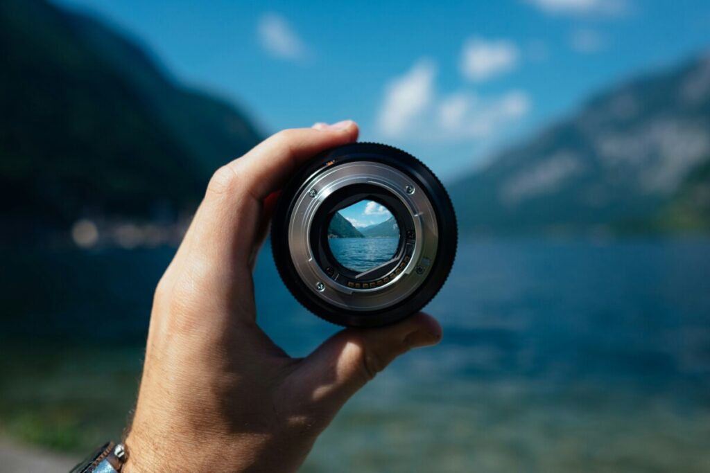 see-through camera lens on a lake